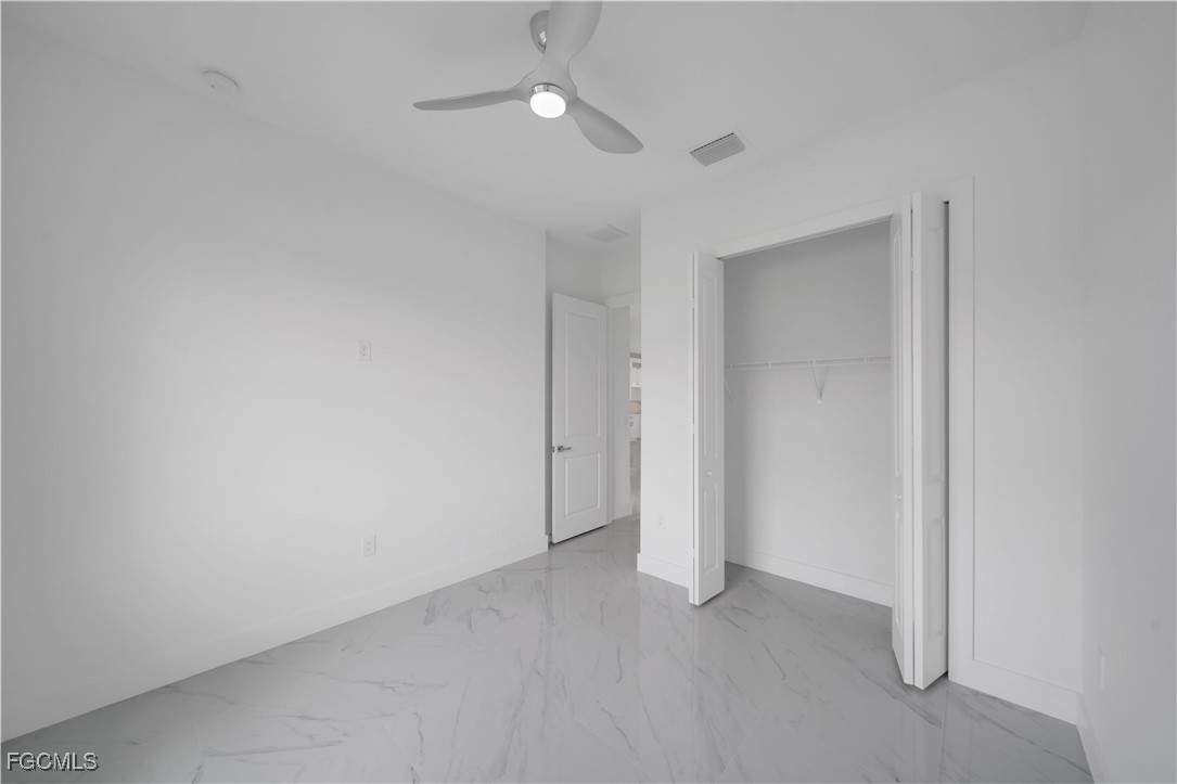 1153 Countess Avenue Lehigh Acres, FL 33974 - Photo 26 of 37 a view of an empty room