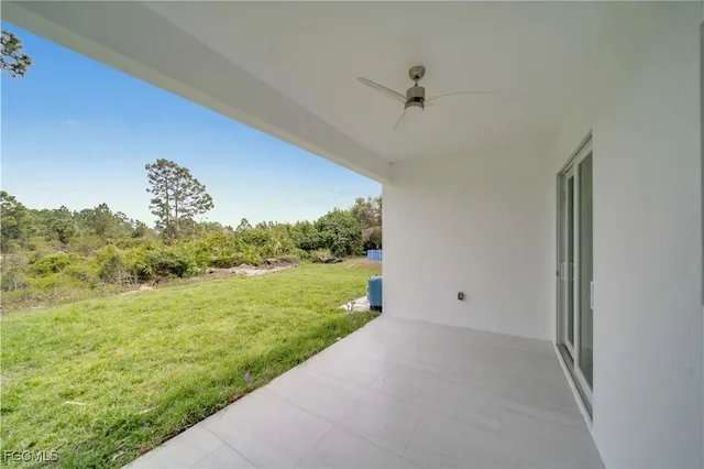 a view of a big room with a yard