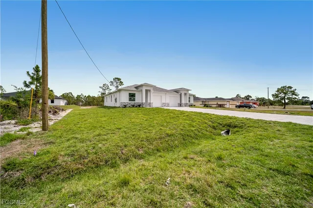 a view of a house with a big yard