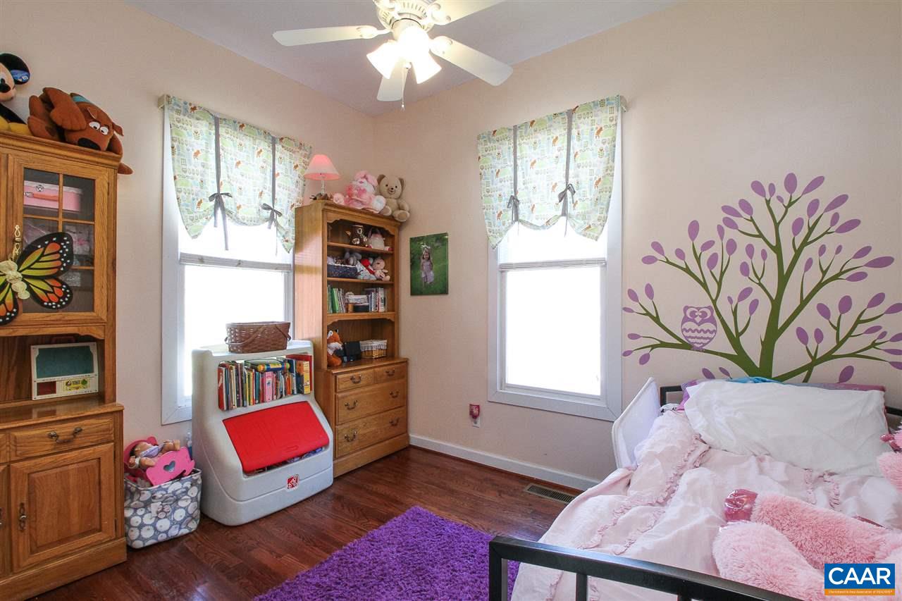 364 Lake Road Troy, VA 22974 - Photo 14 of 25 a living room with furniture and a window