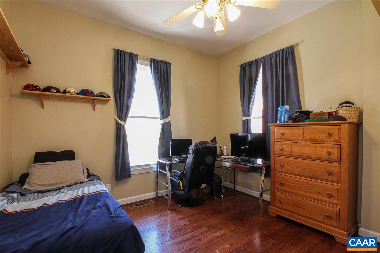 364 Lake Road Troy, VA 22974 - Photo 15 of 25 a view of a workspace with furniture and a window