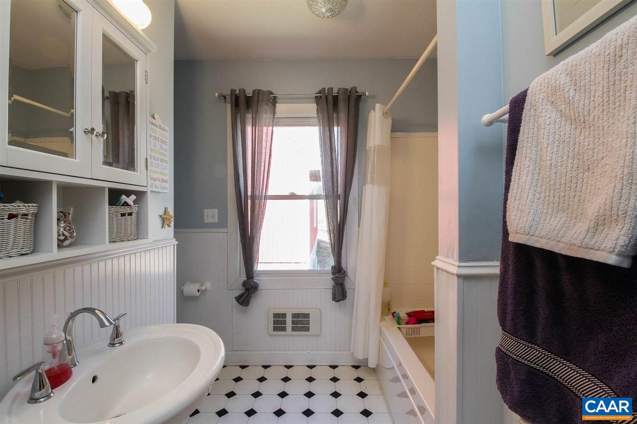 364 Lake Road Troy, VA 22974 - Photo 16 of 25 a bathroom with a sink toilet and shower