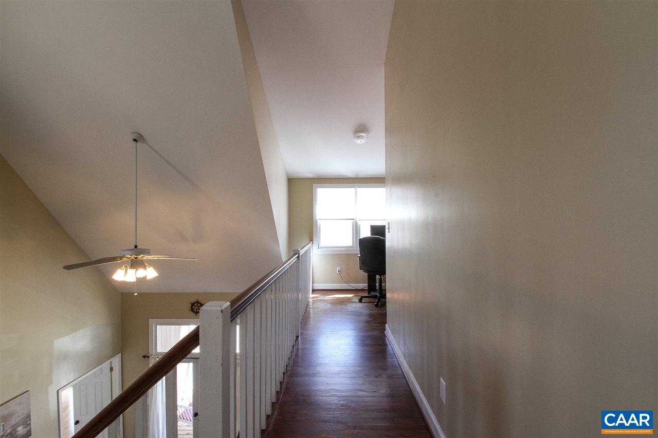 364 Lake Road Troy, VA 22974 - Photo 17 of 25 a view of a hallway with wooden floor