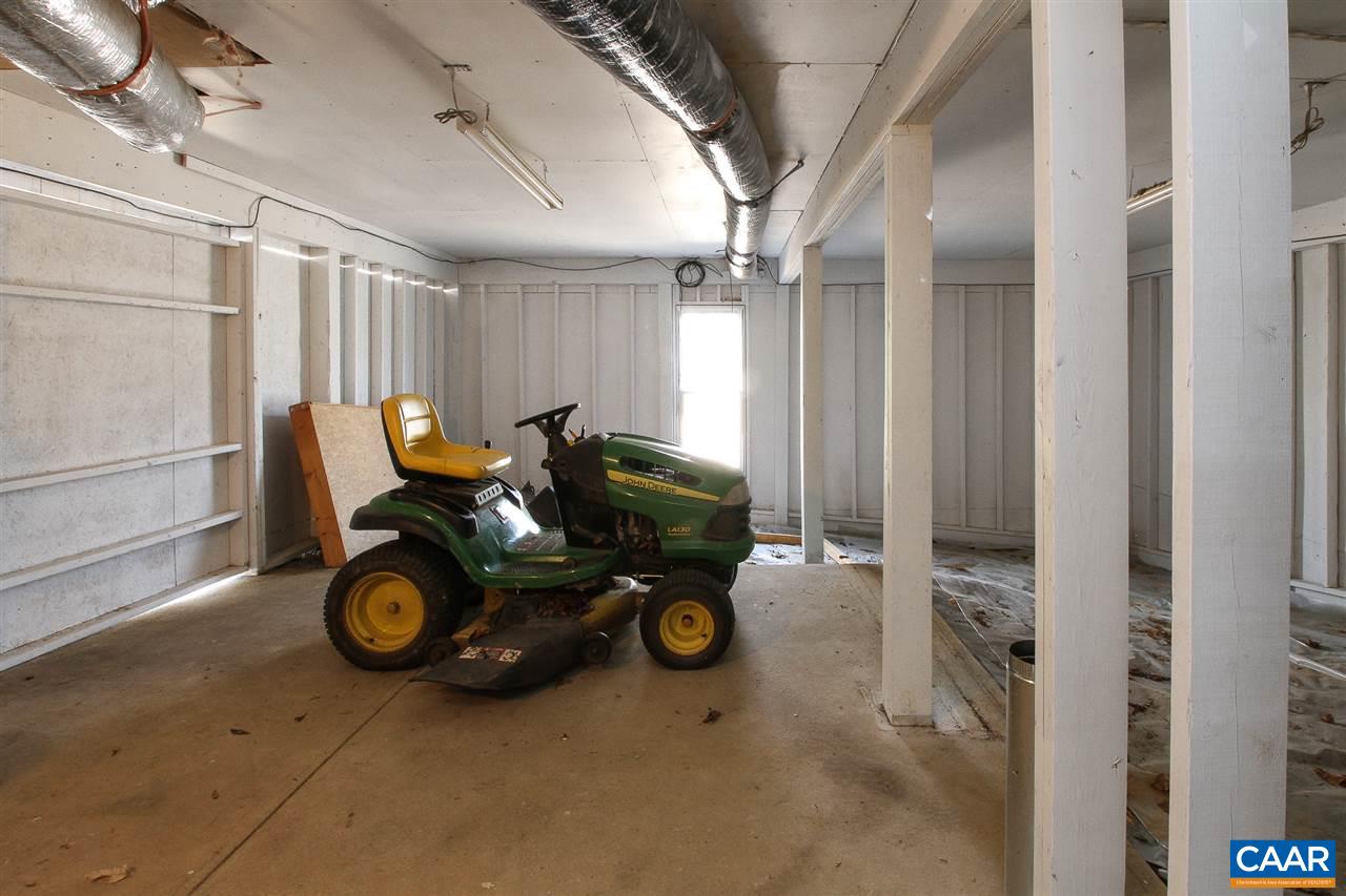 364 Lake Road Troy, VA 22974 - Photo 24 of 25 a car is parked in a parking garage