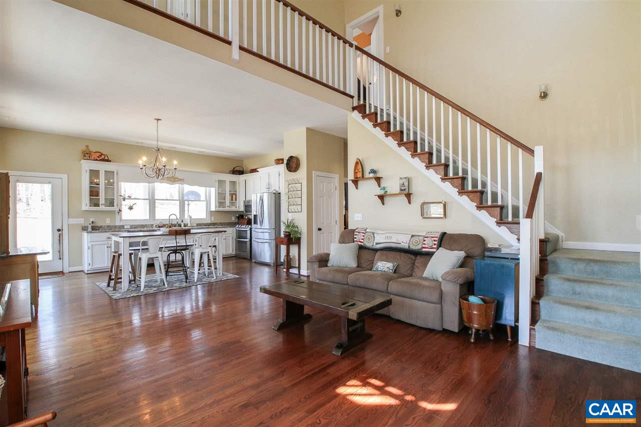 364 Lake Road Troy, VA 22974 - Photo 7 of 25 a living room with furniture and wooden floor