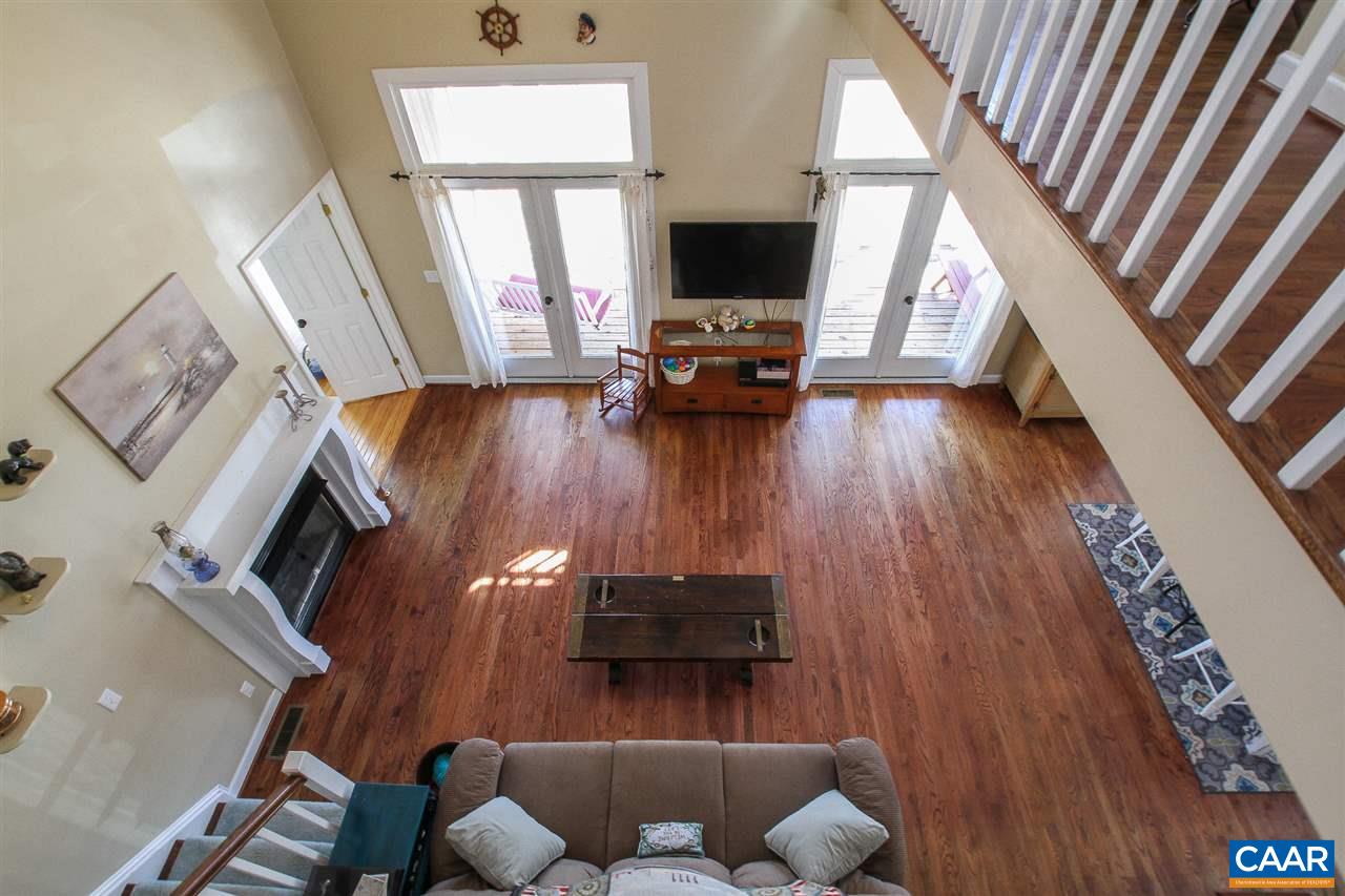 364 Lake Road Troy, VA 22974 - Photo 10 of 25 a living room with furniture and a flat screen tv