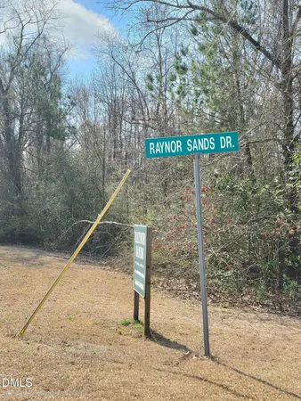 a sign that is on the side of a road
