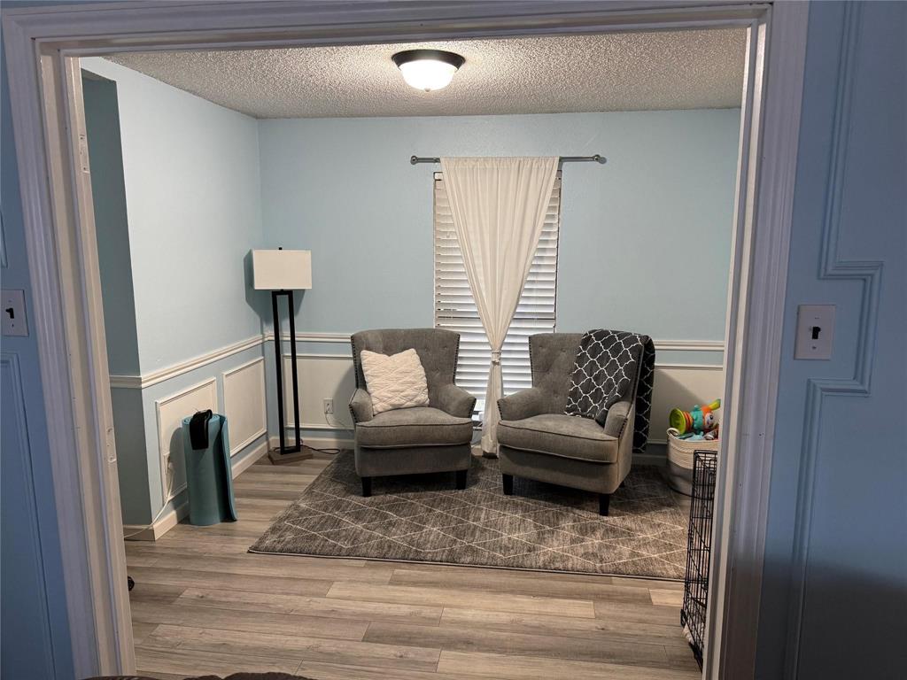 2412 Ridgestone Drive Dallas, TX 75287 - Photo 11 of 23 a living room with furniture and a couch