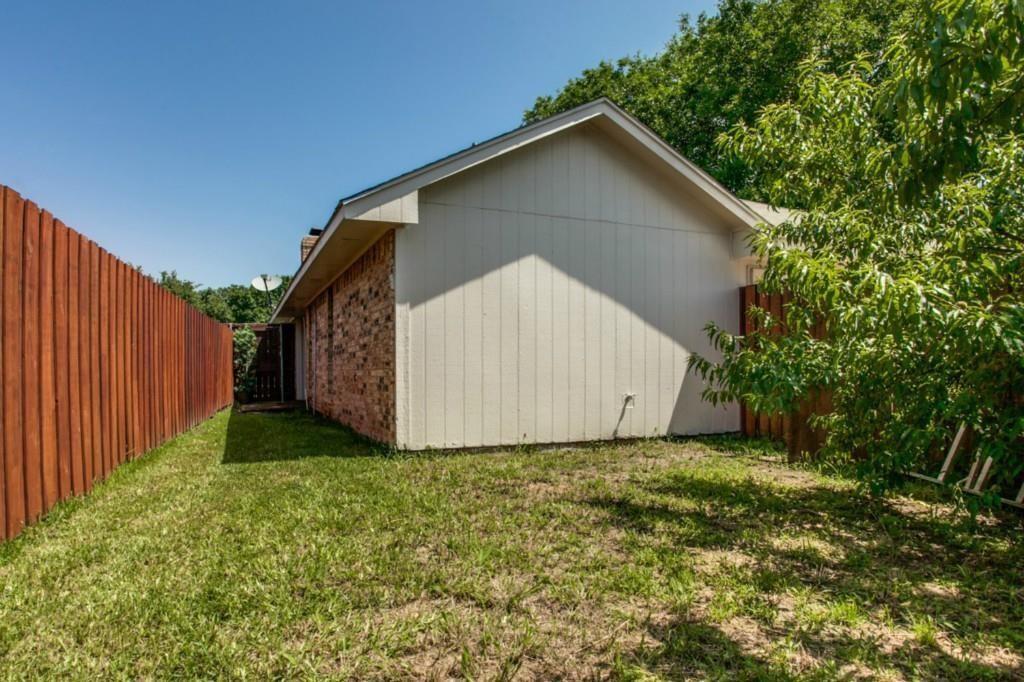 2412 Ridgestone Drive Dallas, TX 75287 - Photo 2 of 23 a view of a small house with a yard
