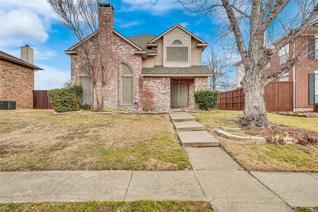 8105 Eagle Drive Rowlett, TX 75088 - Photo 1 of 35 a front view of a house with a yard