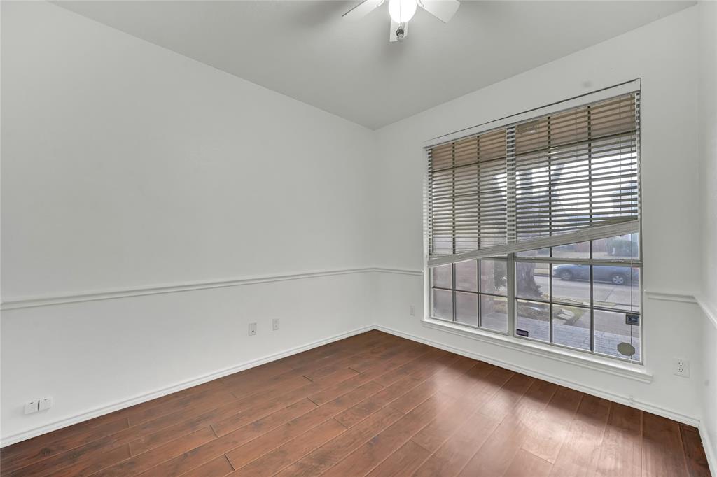 8105 Eagle Drive Rowlett, TX 75088 - Photo 18 of 35 wooden floor in an empty room with a window