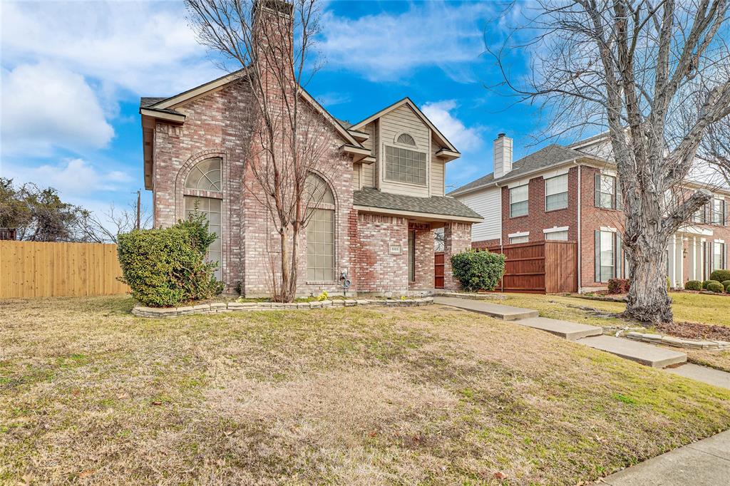 8105 Eagle Drive Rowlett, TX 75088 - Photo 2 of 35 a front view of a house with a garden