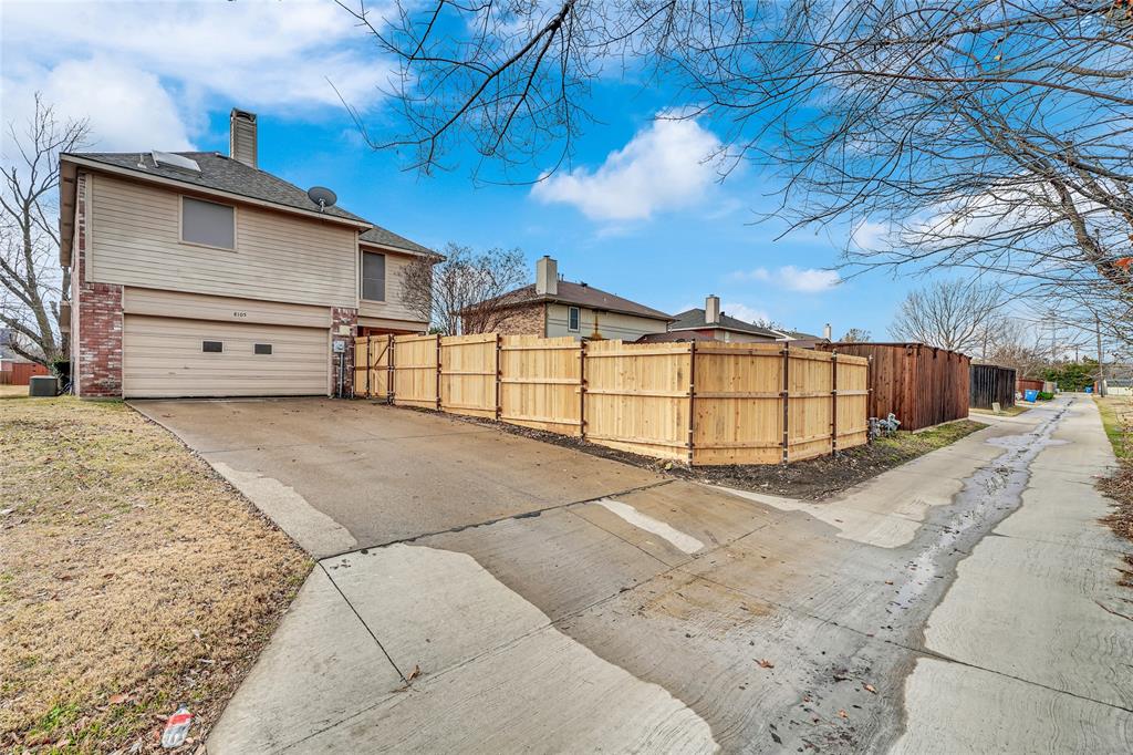 8105 Eagle Drive Rowlett, TX 75088 - Photo 35 of 35 a view of a house with a snow in the yard
