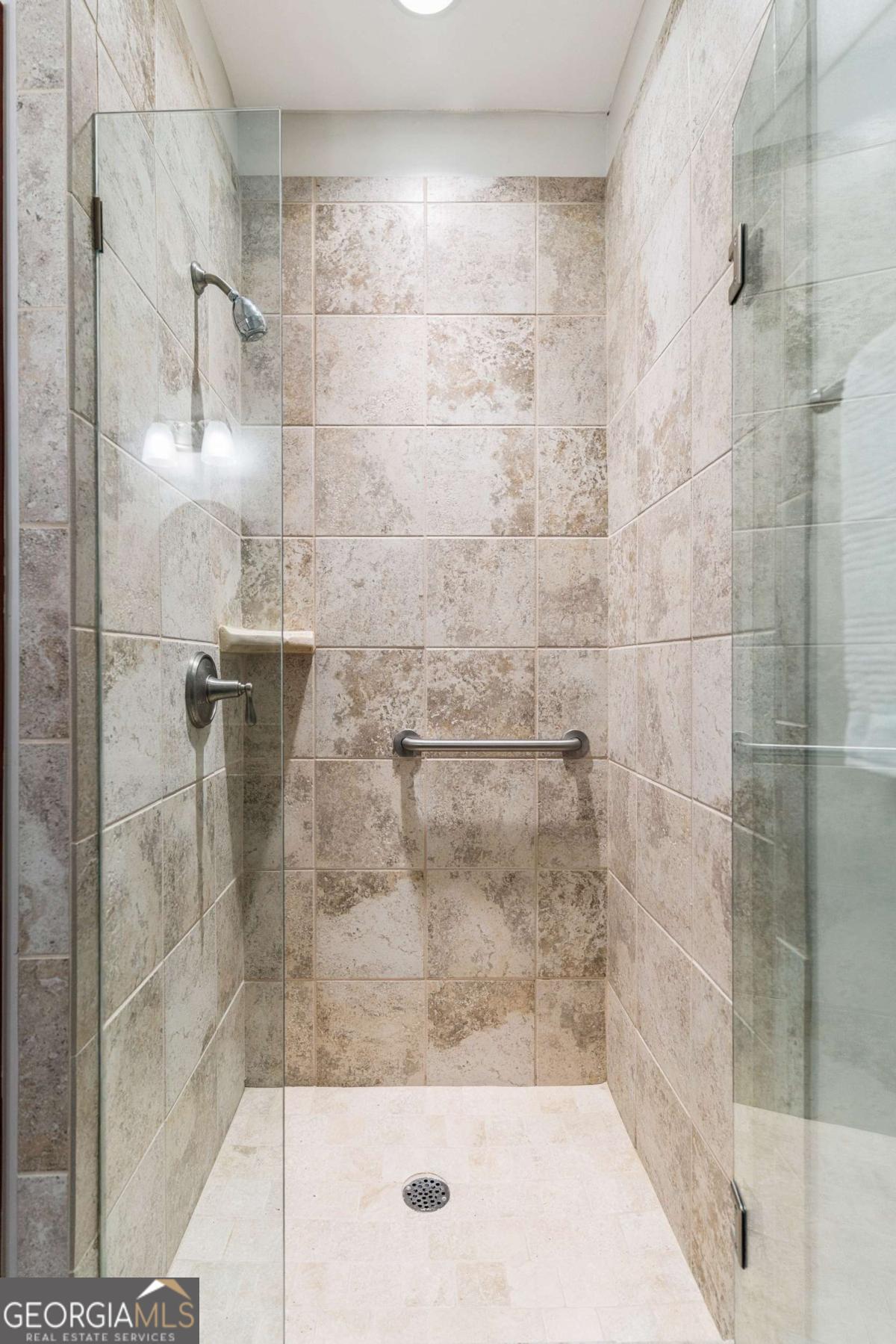 150 Rice Mill St. Simons Island, GA 31522 - Photo 22 of 38 a bathroom with a shower