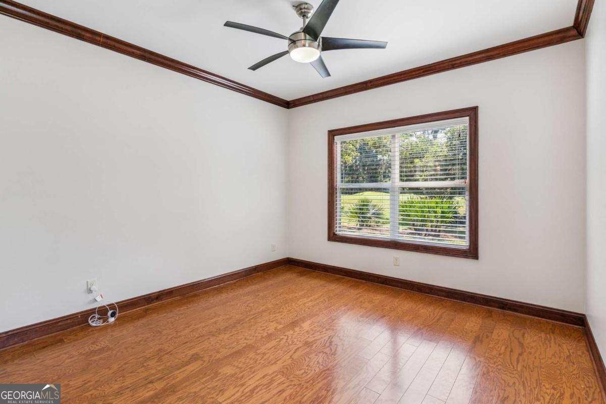 150 Rice Mill St. Simons Island, GA 31522 - Photo 23 of 38 a view of an empty room with a window