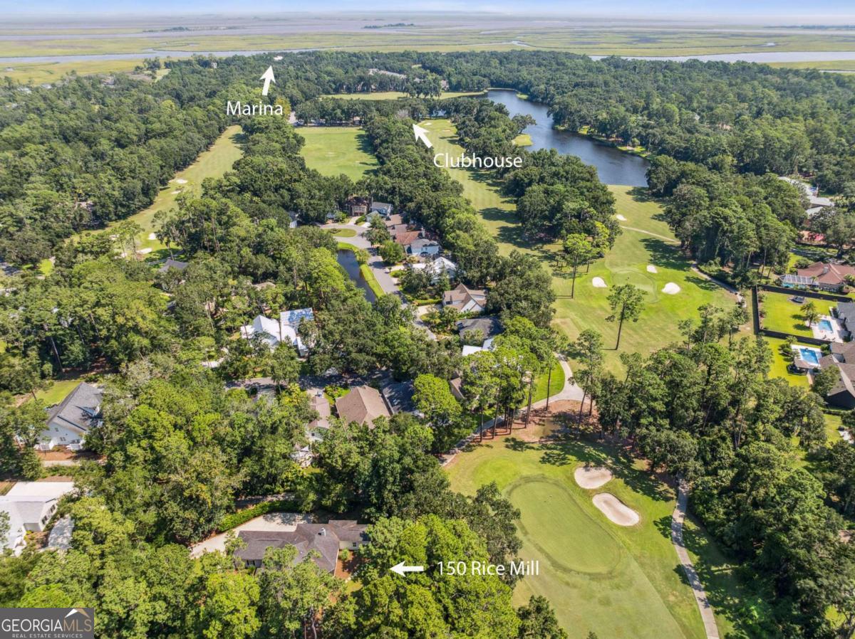 150 Rice Mill St. Simons Island, GA 31522 - Photo 33 of 38 an aerial view of residential houses with outdoor space and trees