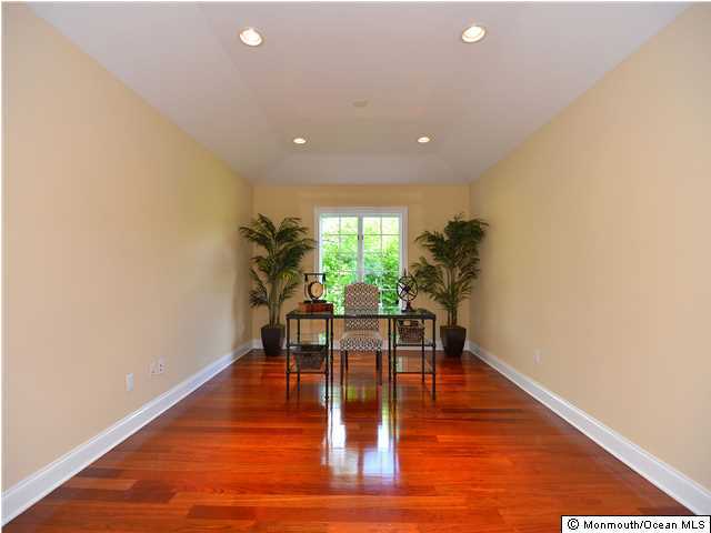 1813 Celeste Drive Wall, NJ 07719 - Photo 8 of 22 a view of a dining room with furniture and wooden floor