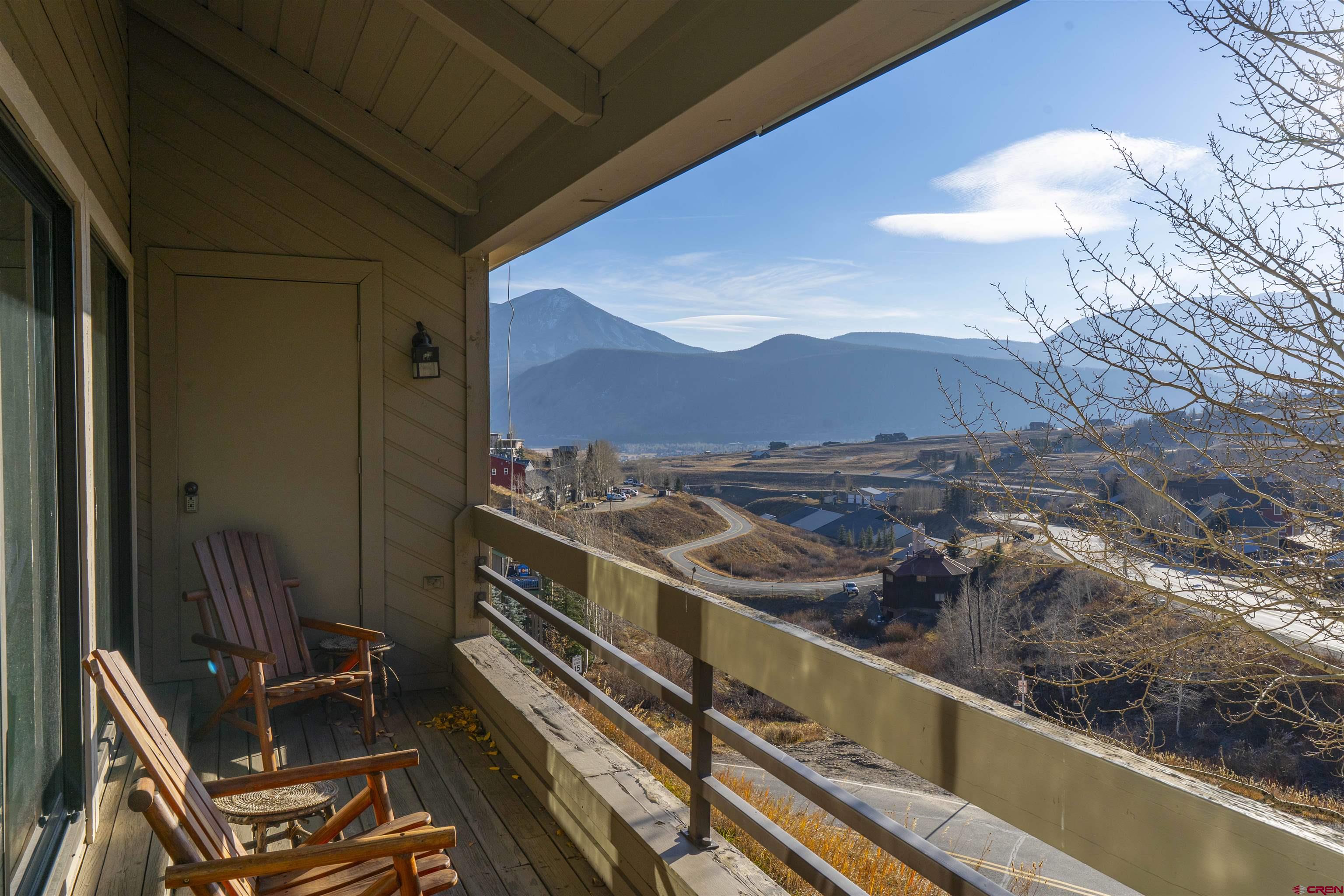 11 Hunter Hill Road, Unit 406 Crested Butte, CO 81225 - Photo 20 of 45 a view of a balcony with an ocean