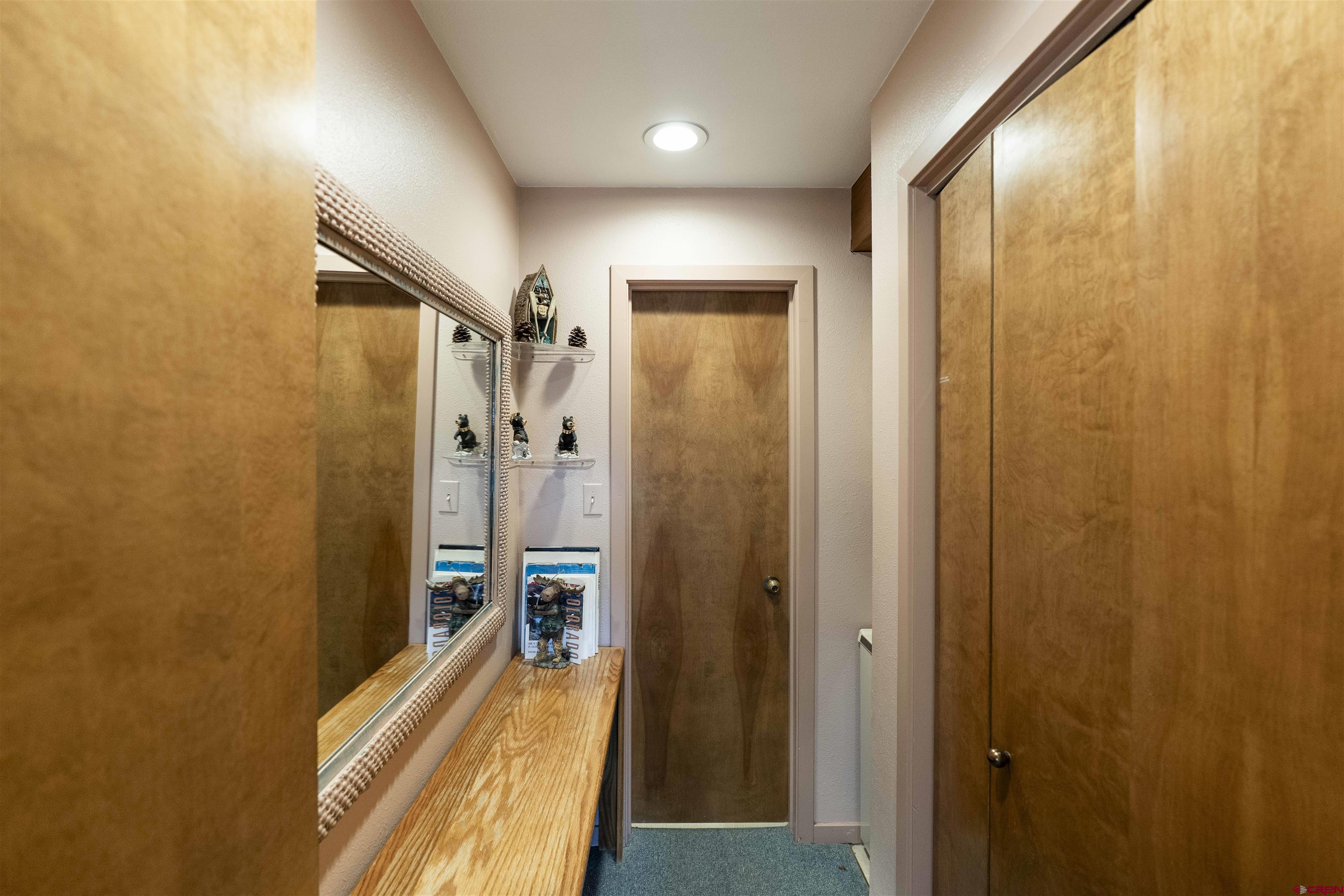 11 Hunter Hill Road, Unit 406 Crested Butte, CO 81225 - Photo 24 of 45 a view of a bathroom with a tub and a shower