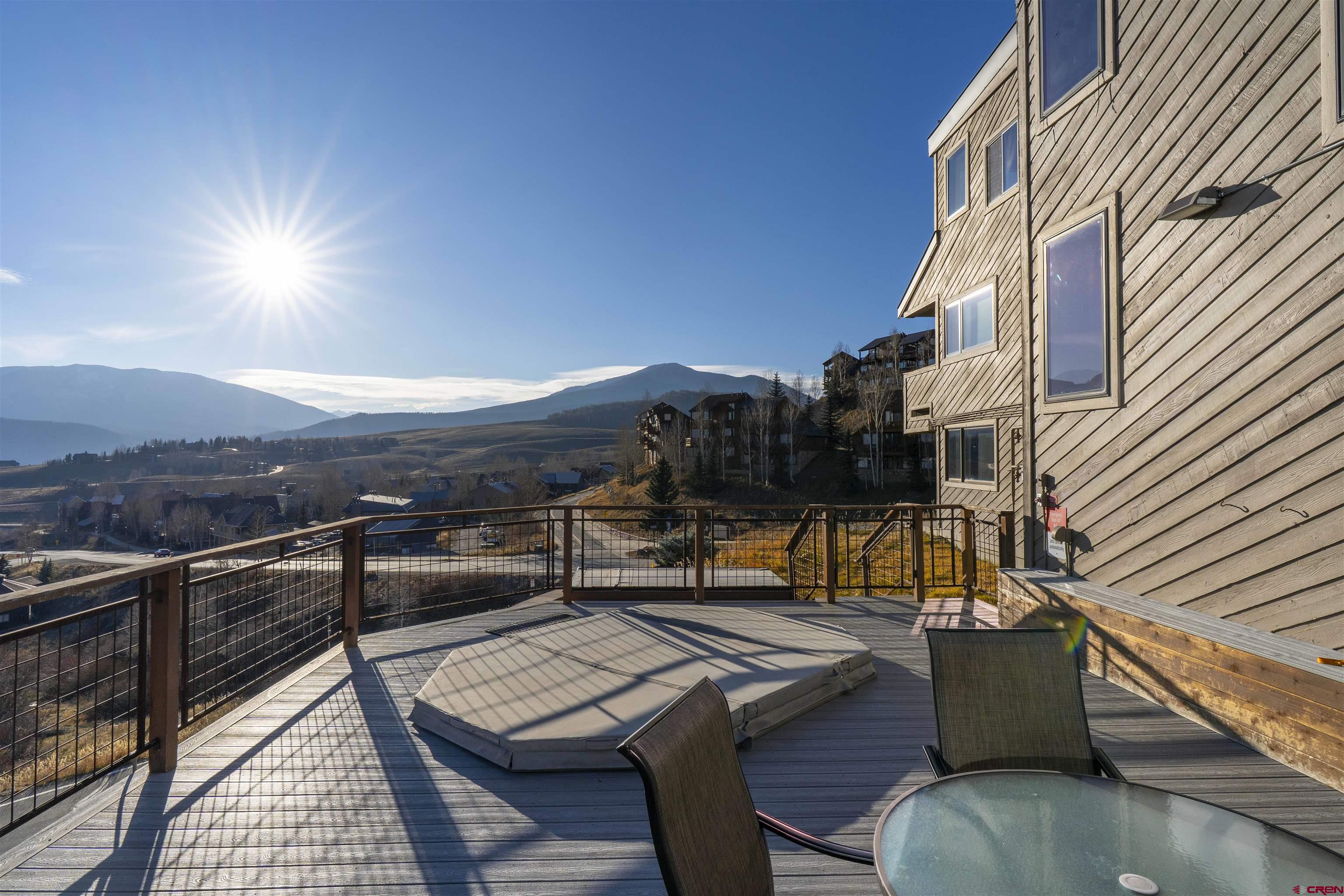 11 Hunter Hill Road, Unit 406 Crested Butte, CO 81225 - Photo 32 of 45 a view of terrace with seating area and barbeque oven