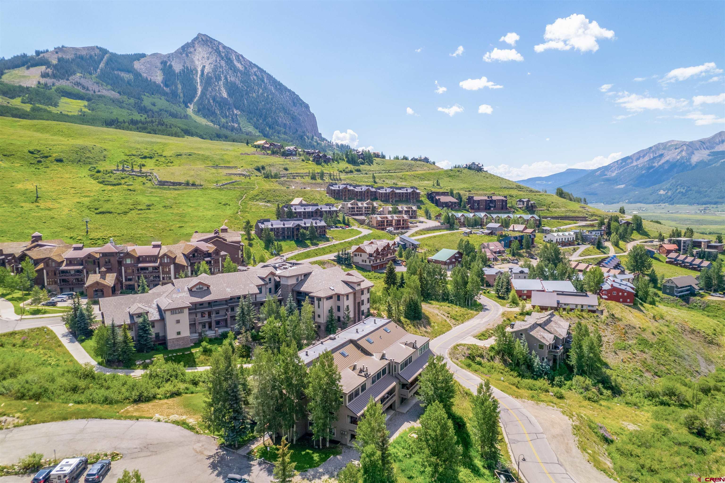 11 Hunter Hill Road, Unit 406 Crested Butte, CO 81225 - Photo 41 of 45 a view of a city with a lake