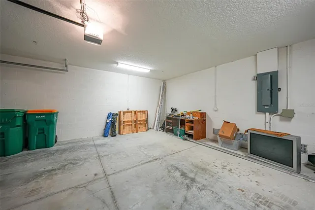 an aerial view of a house with garden space and street view