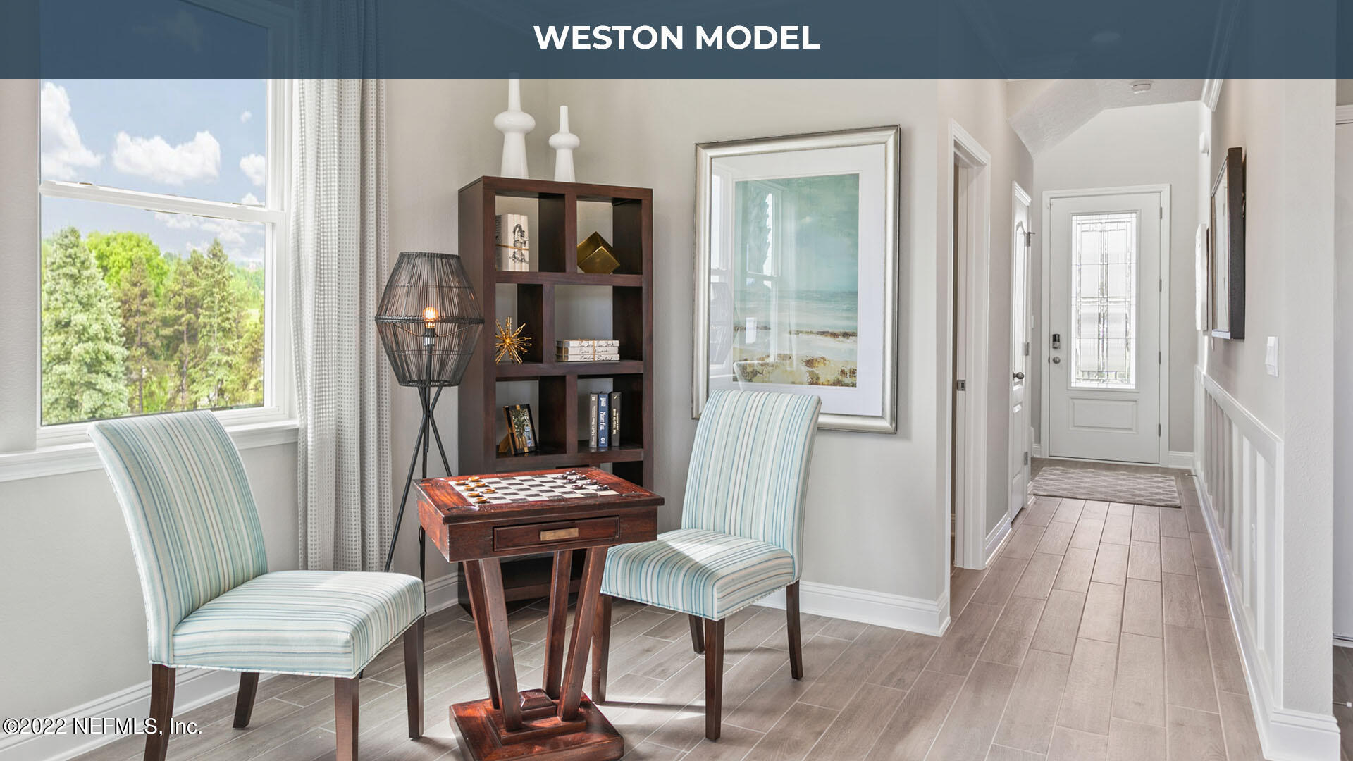 191 Millerstone Drive St. Augustine, FL 32092 - Photo 5 of 44 a view of a hallway with furniture and wooden floor