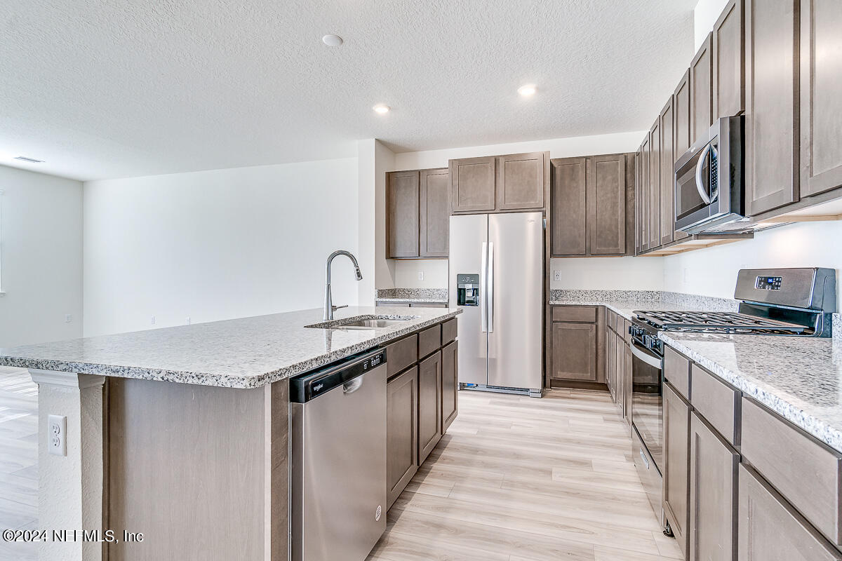 7882 Rippa Vly Way Jacksonville, FL 32222 - Photo 11 of 23 11- Kitchen
