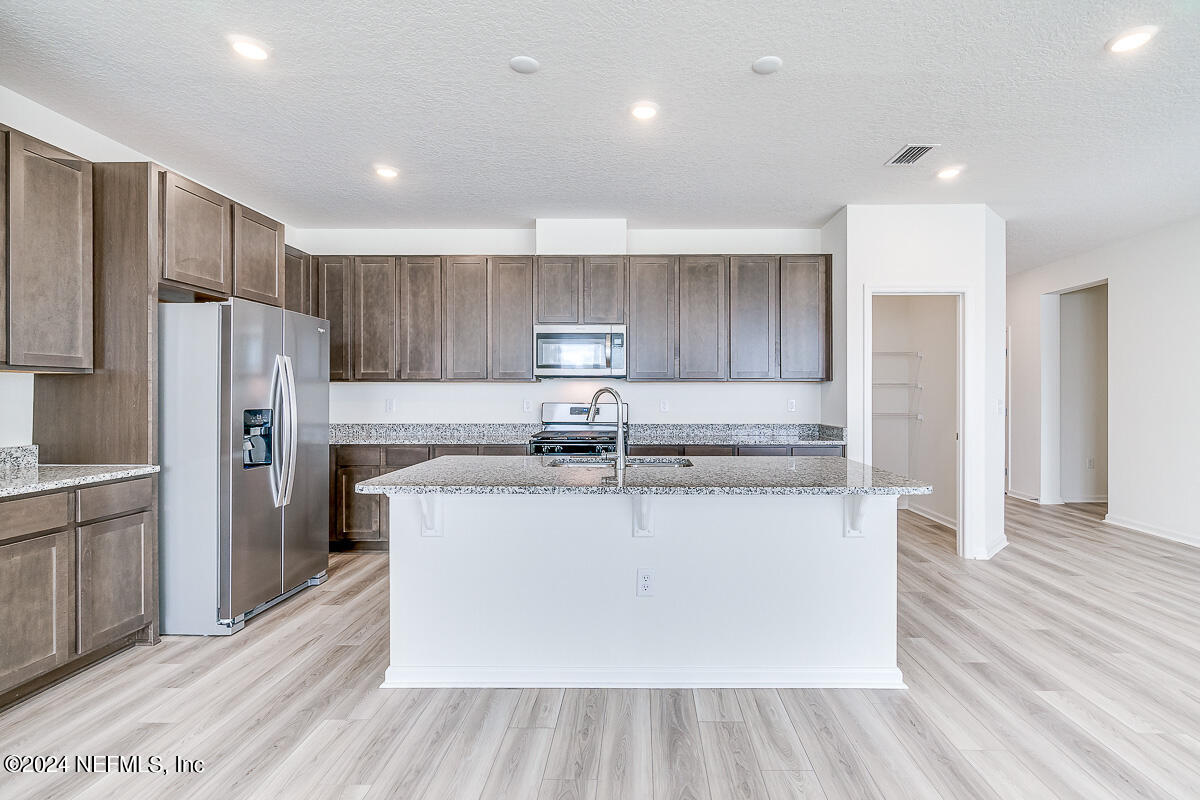 7882 Rippa Vly Way Jacksonville, FL 32222 - Photo 8 of 23 9 - Kitchen