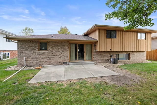 a front view of a house with yard