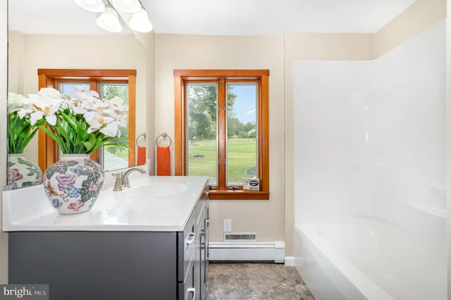 a backyard of a house with seating space