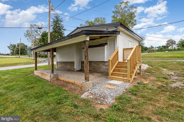a view of a backyard with a garden