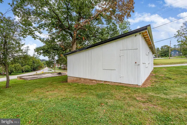 an aerial view of a house with swimming pool