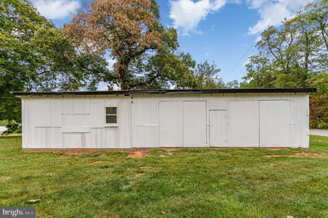 a aerial view of a house with a yard