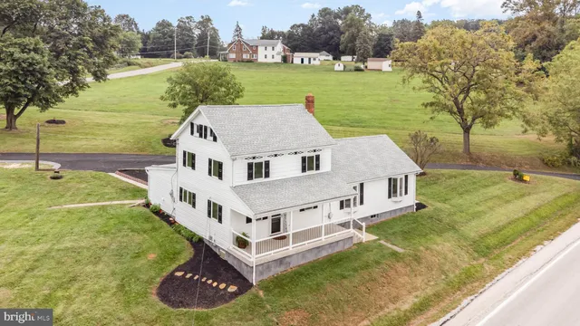 a view of swimming pool with a yard