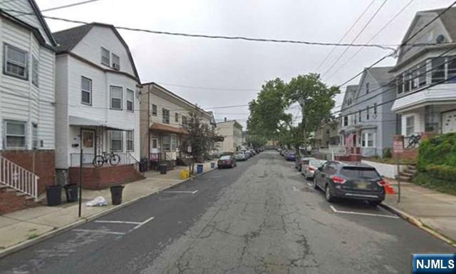 44 Washington Street, Unit 2F Harrison, NJ 07029 - Photo 6 of 9 a view of a street with cars