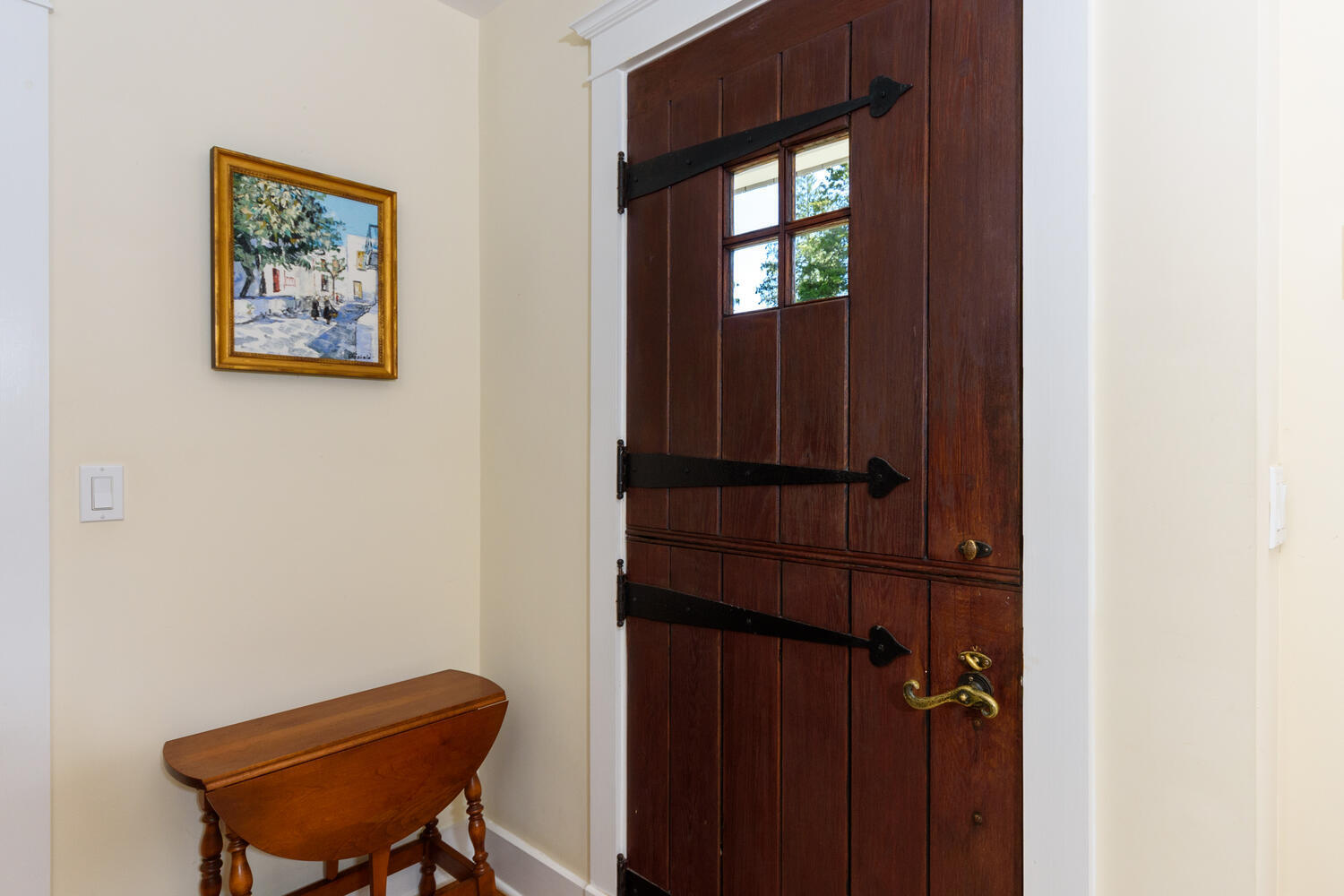 327 Hollow Tree Ridge Road Darien, CT 06820 - Photo 15 of 37 a view of a hallway with front door and wooden floor