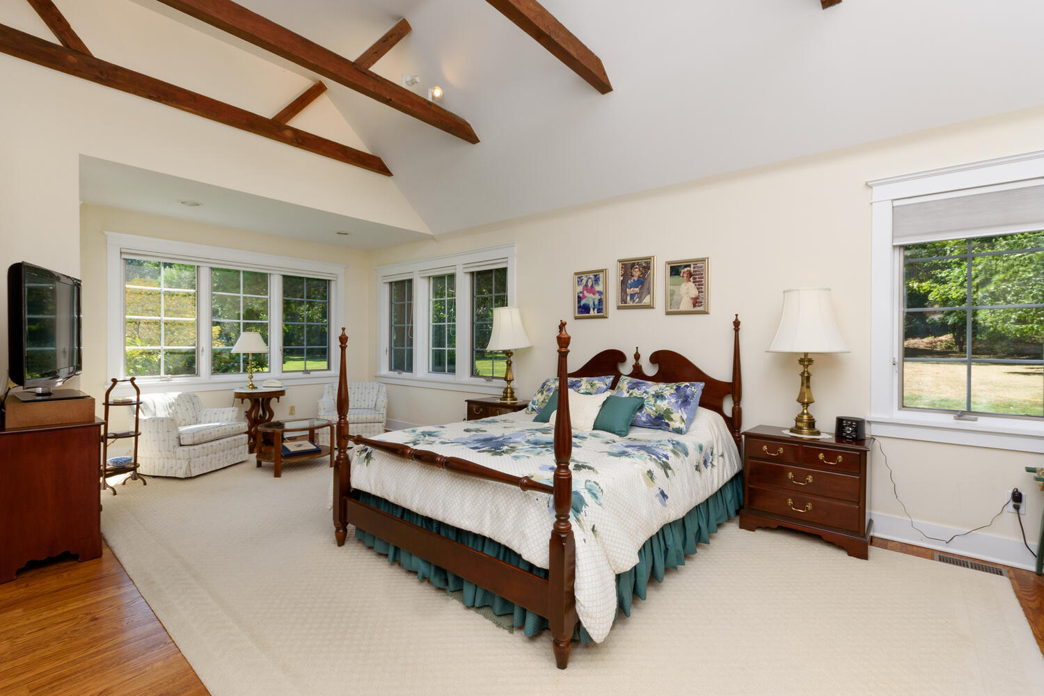 327 Hollow Tree Ridge Road Darien, CT 06820 - Photo 16 of 37 a bedroom with a bed and large window