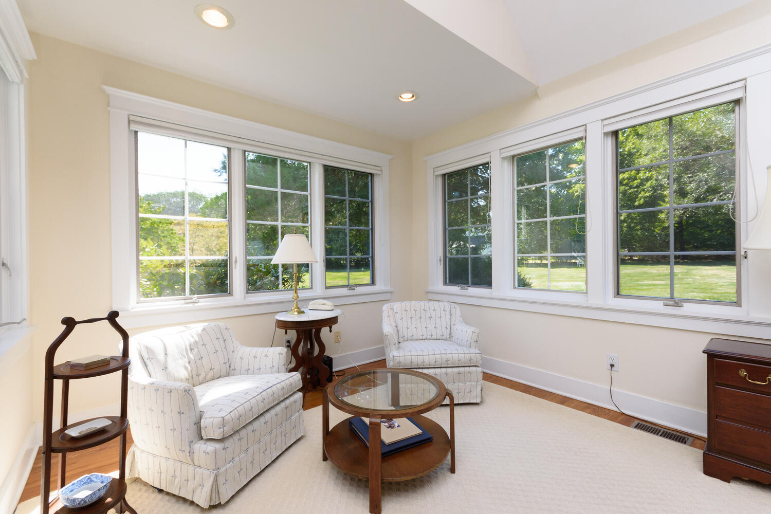 327 Hollow Tree Ridge Road Darien, CT 06820 - Photo 17 of 37 a living room with furniture and a large window