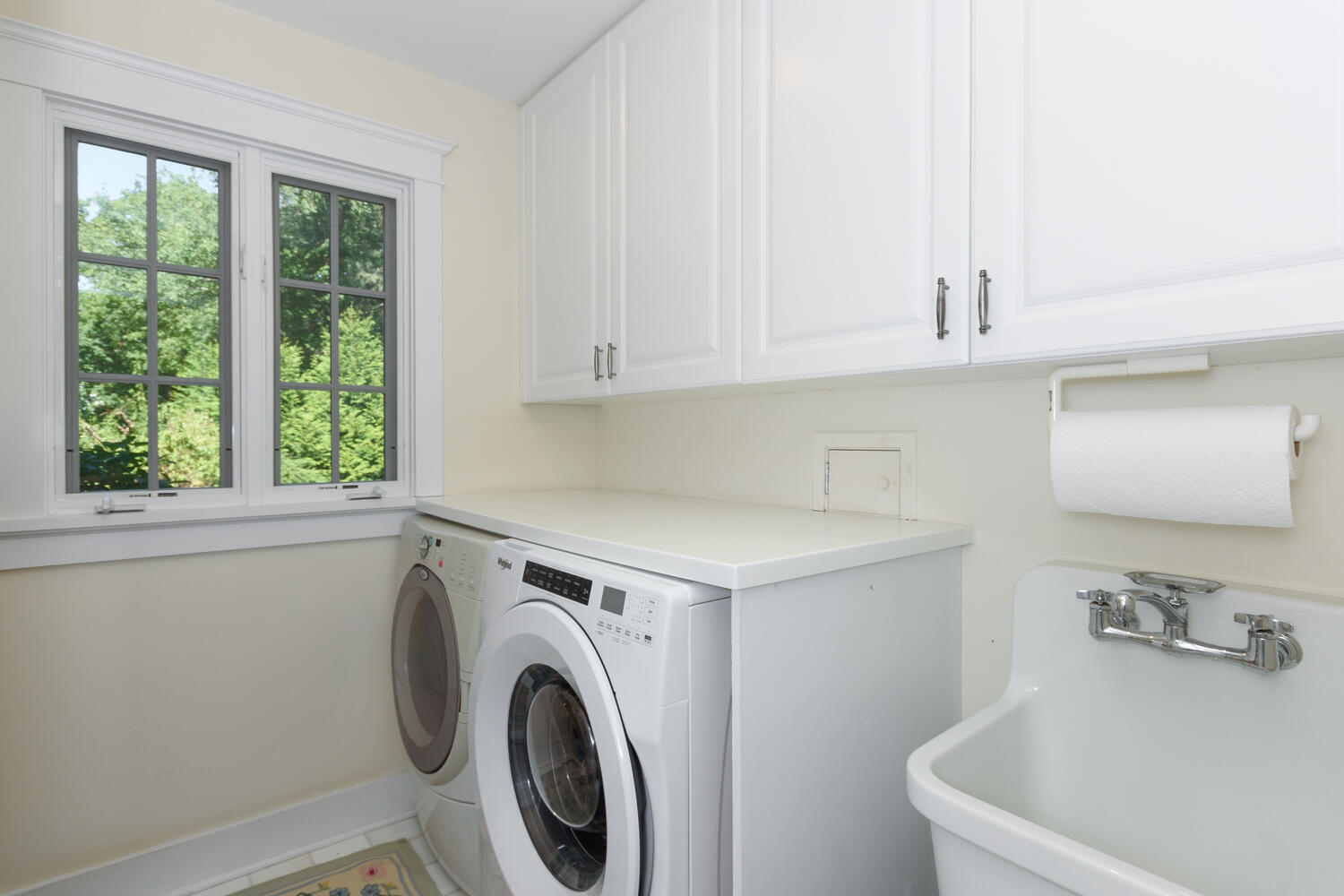 327 Hollow Tree Ridge Road Darien, CT 06820 - Photo 21 of 37 a utility room with dryer and washer