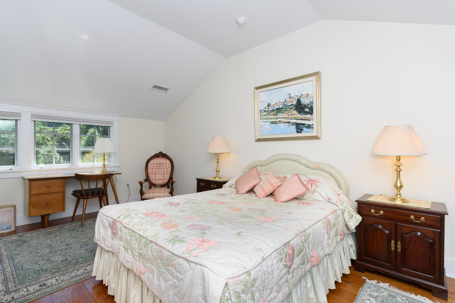 327 Hollow Tree Ridge Road Darien, CT 06820 - Photo 24 of 37 a bedroom with a bed and a table with window