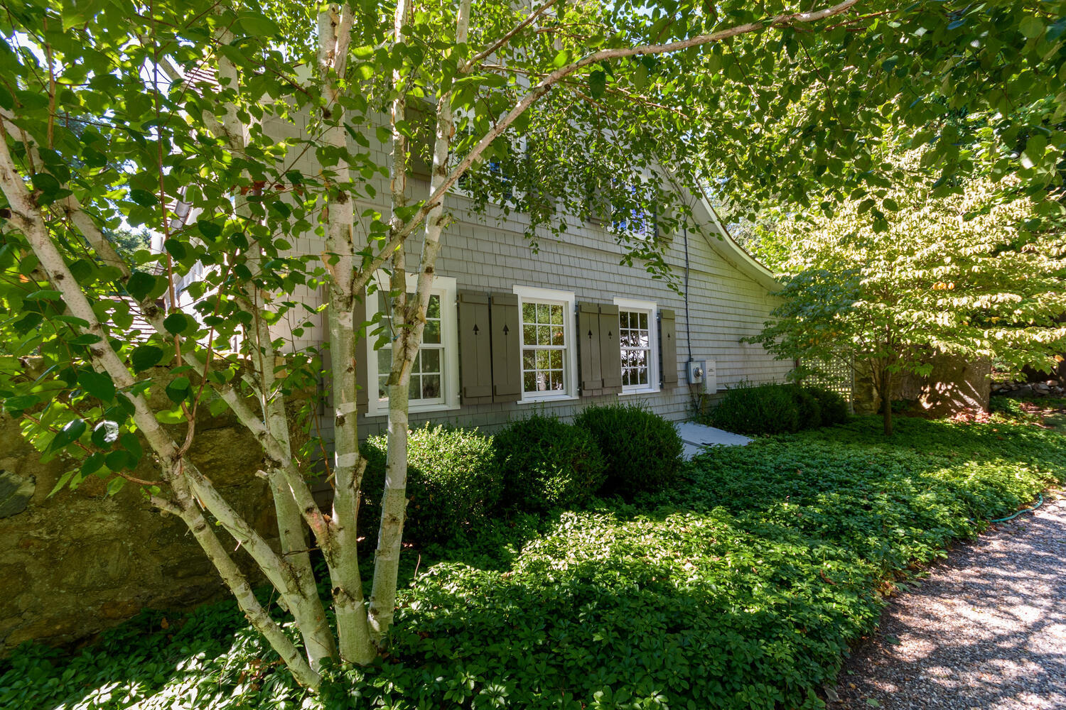 327 Hollow Tree Ridge Road Darien, CT 06820 - Photo 33 of 37 a view of a house with a tree