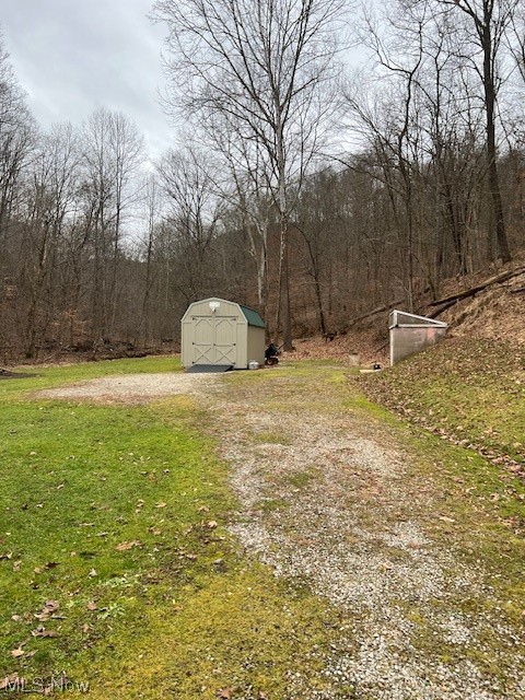 2855 Long Run Road Cairo, WV 26337 - Photo 23 of 25 View of yard with a storage shed