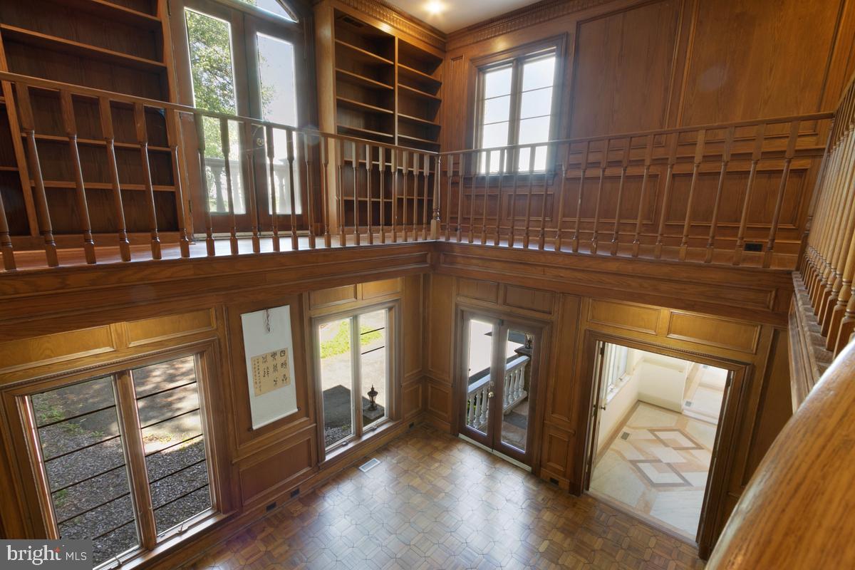 613 Rivercrest Drive McLean, VA 22101 - Photo 11 of 40 a view of an entryway with wooden floor and door