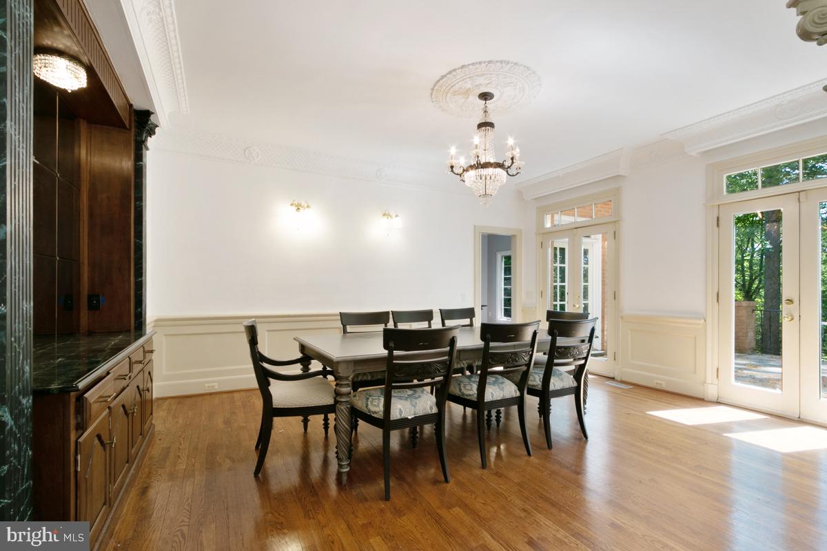 613 Rivercrest Drive McLean, VA 22101 - Photo 13 of 40 a view of a dining room with furniture and wooden floor