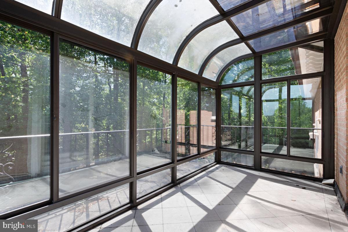 613 Rivercrest Drive McLean, VA 22101 - Photo 22 of 40 a view of a porch with a floor to ceiling window