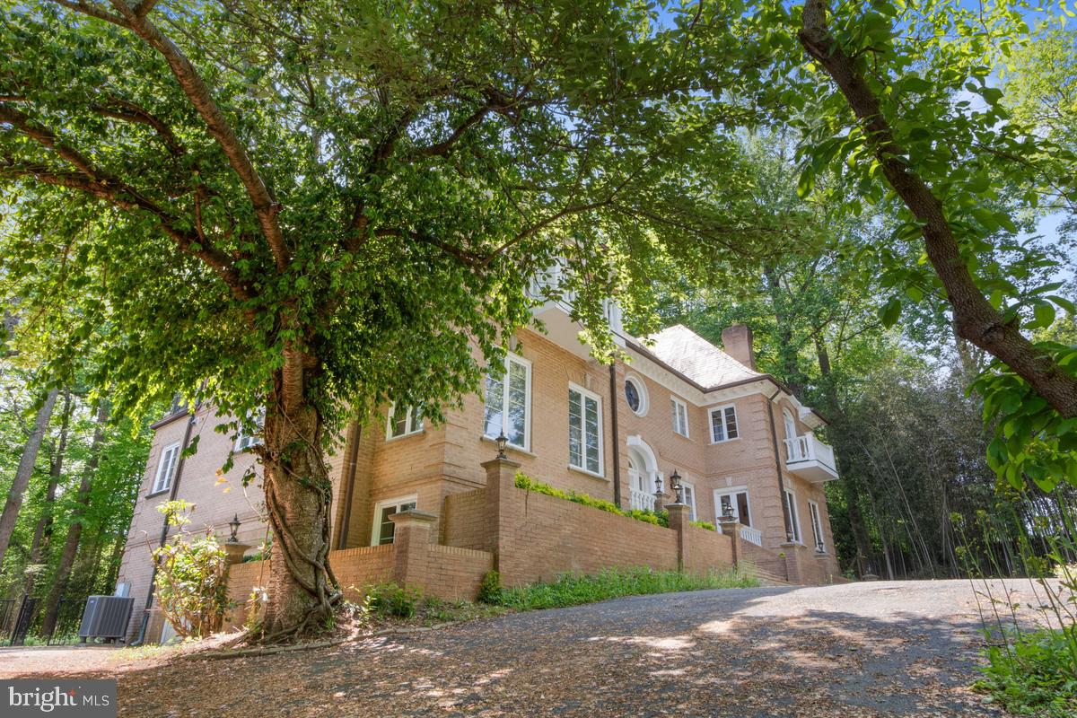613 Rivercrest Drive McLean, VA 22101 - Photo 5 of 40 a view of house with a tree in front of it