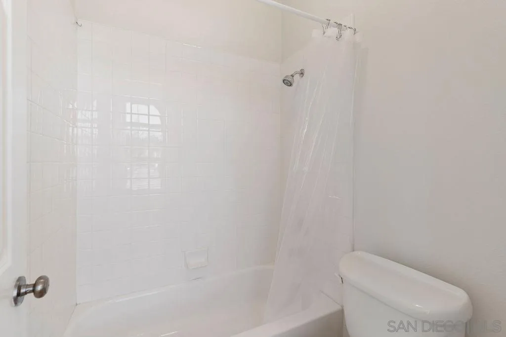 197 Double Eagle Glen Escondido, CA 92026 - Photo 19 of 70 a white toilet sitting next to a bath tub