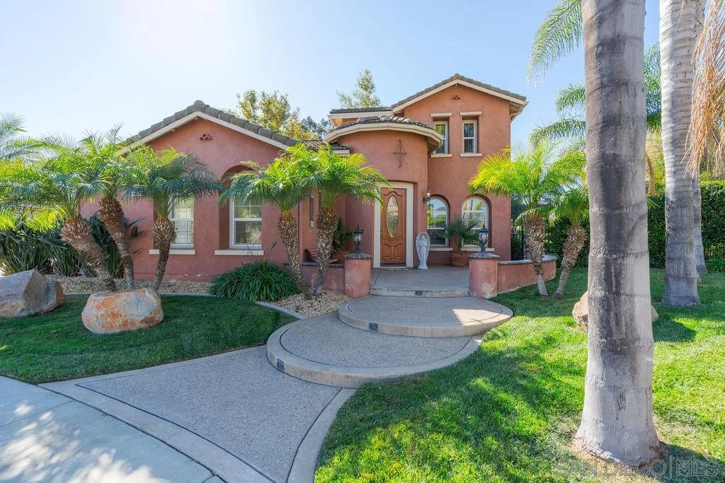 197 Double Eagle Glen Escondido, CA 92026 - Photo 2 of 70 a front view of a house with garden