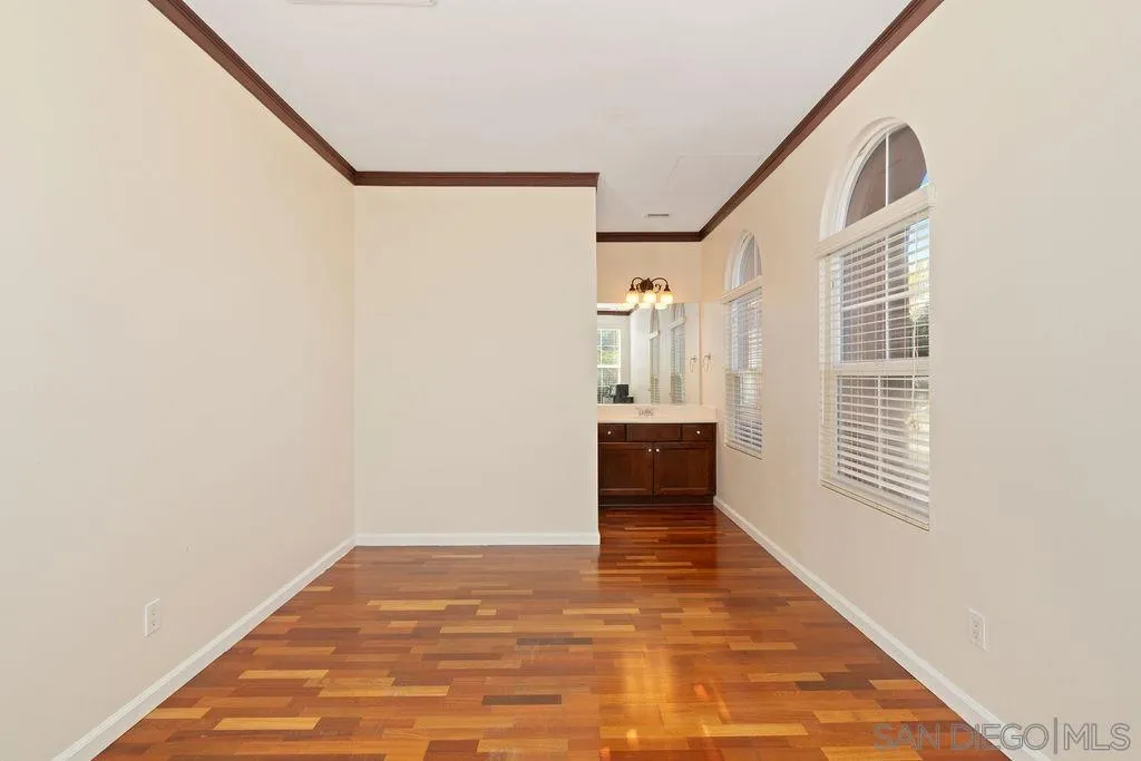 197 Double Eagle Glen Escondido, CA 92026 - Photo 35 of 70 a bathroom with a sink and a mirror